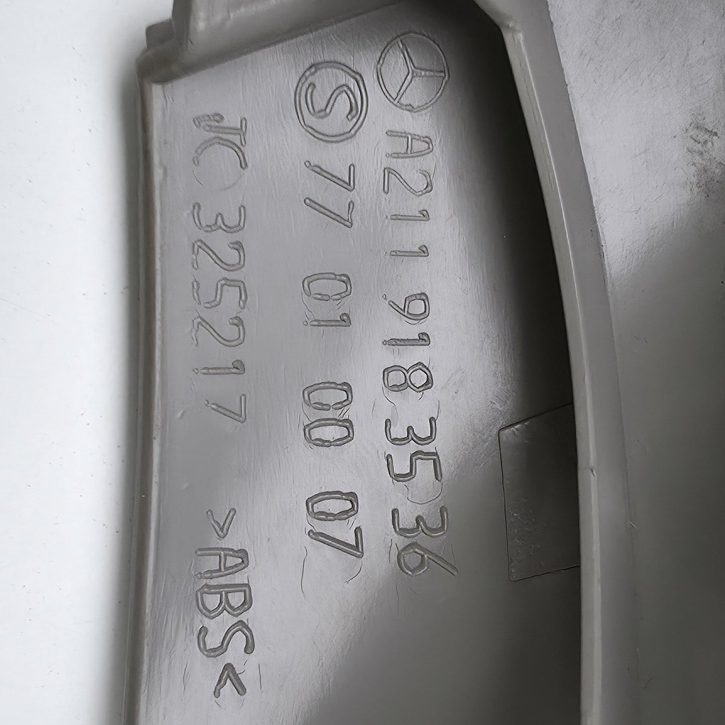 2003-2009 Mercedes E350 FRONT LEFT LOWER SEAT PLASTIC TRIM A2119183536