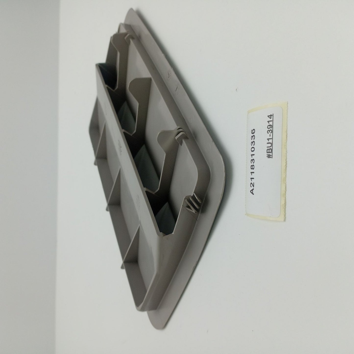 2004-2008 Mercedes-Benz CLS REAR AIR VENT BAFFLE FLOOR TRIM A2118310336