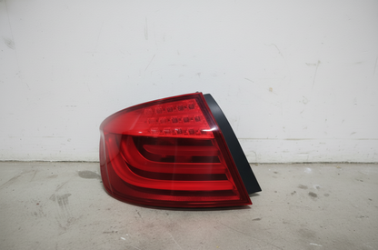 2011–2016 BMW 520i Left Rear Tail Light in Side Panel USED OEM 63217203229